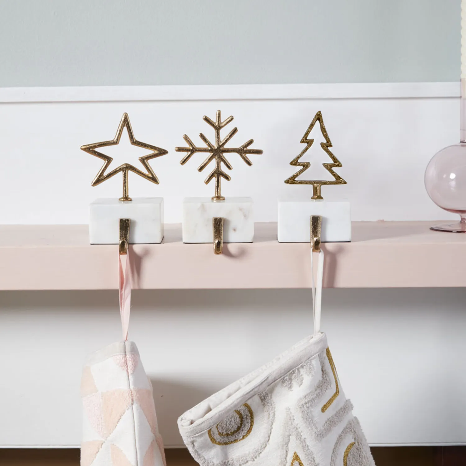 Festive White Marble Stocking Holders